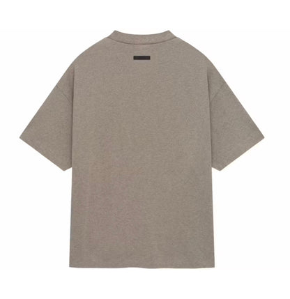 A heather taupe short-sleeve t-shirt shown from the back, featuring a small black rectangular label centered below the collar, set against a plain white background.